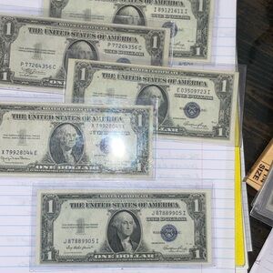 5 pieces $1 Silver Certificates from 1935 barely circulated. No pinholes or rips